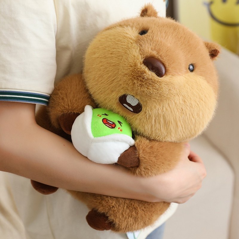 Cute marmot plush toy being hugged, soft and fluffy texture with nut accessory, creating a cozy and comforting moment for relaxation or everyday cuddles