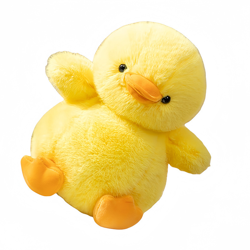 Duck plush toy in yellow with a round chubby shape and soft plush texture, designed as a cute stuffed animal for hugging and home decoration
