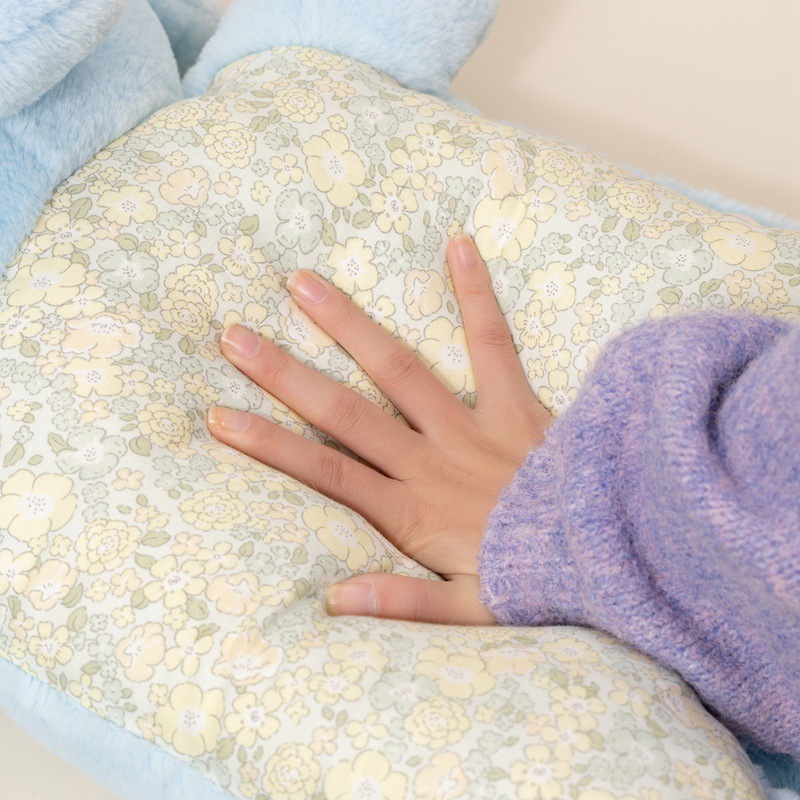 Pajama animal plush pillow fabric detail showing soft plush surface and gentle cushioning feel