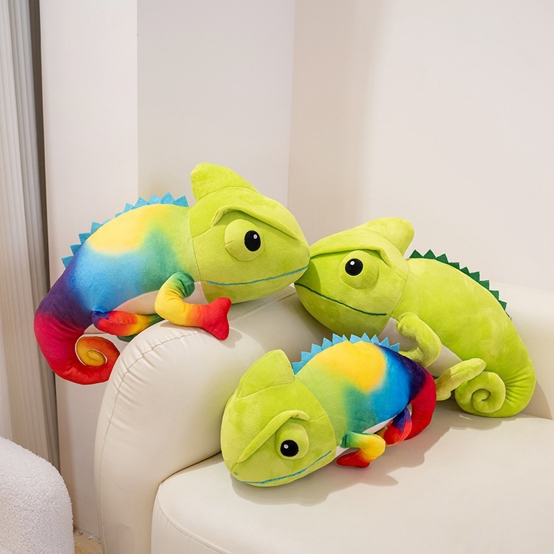 Colorful chameleon plush toys displayed together on a sofa, showing soft texture, playful design, and home decor appeal