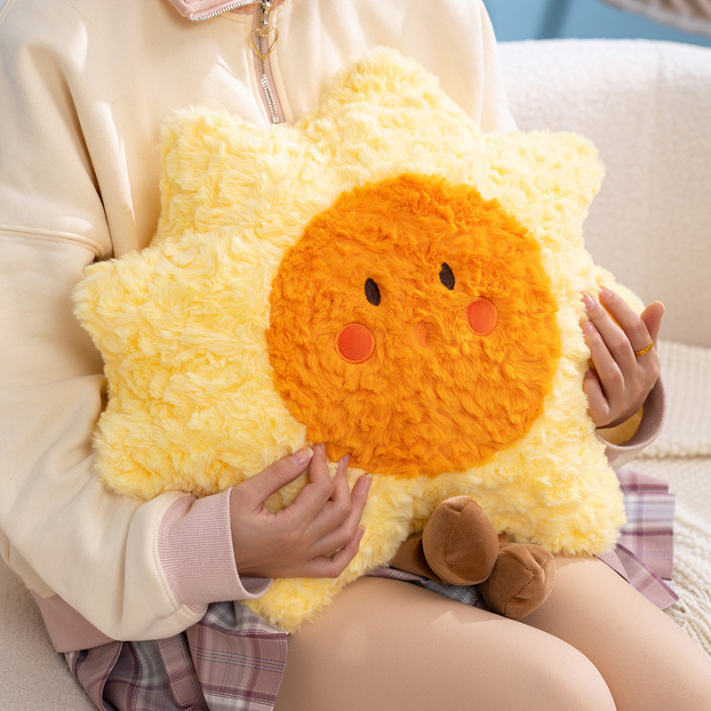 Healing sun plush pillow with soft plush fabric, comforting cushion held for relaxing moments and cozy home decor