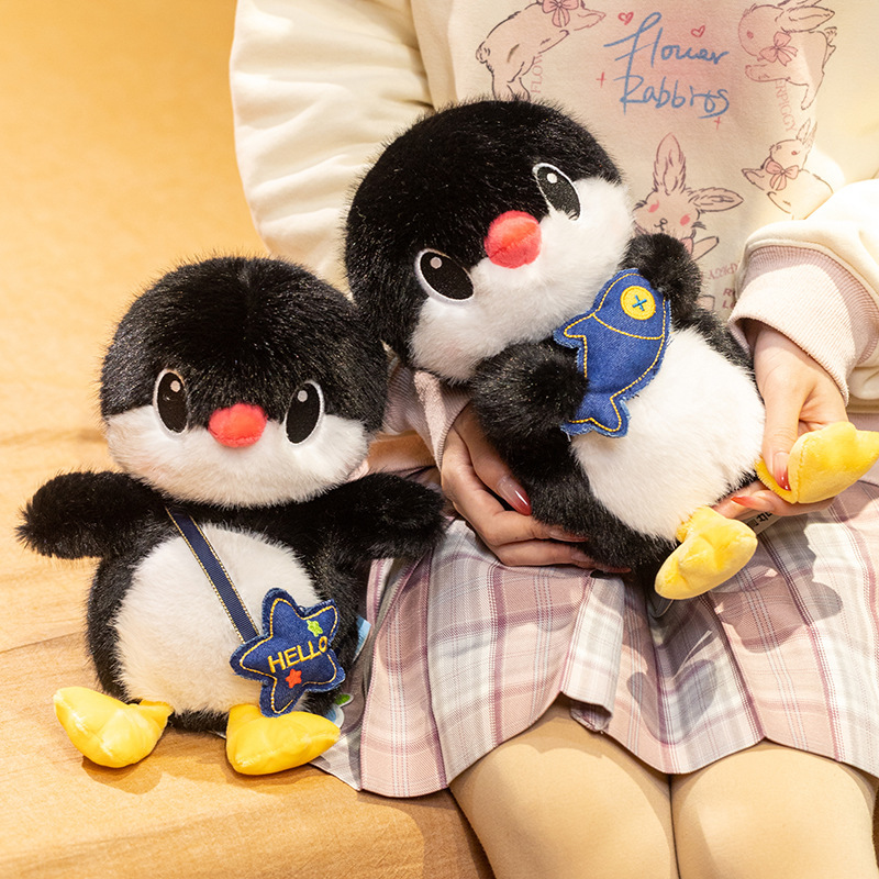 Penguin plush toys in fish and backpack styles for hugging and home decor