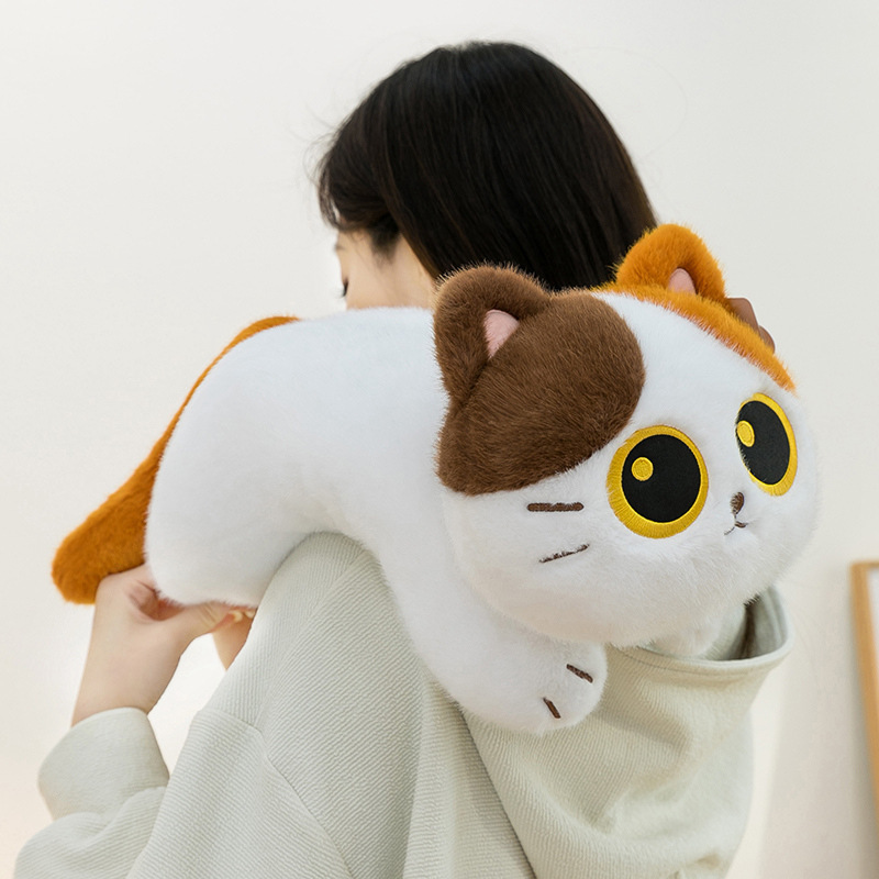 Soft lying calico cat plush toy with a floppy body and cute expression, designed for resting on shoulders or arms and providing a comforting, cozy companion feeling