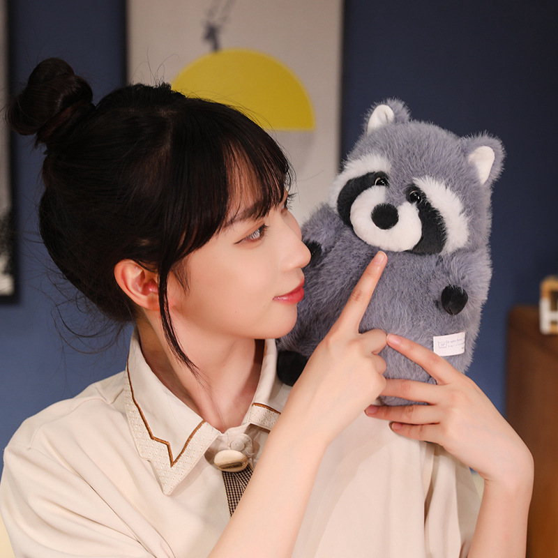 Chubby raccoon plush toy with round body and soft fluffy texture, showing cute facial details and gentle expression, designed for cozy hugging, playful moments, and warm home decor display
