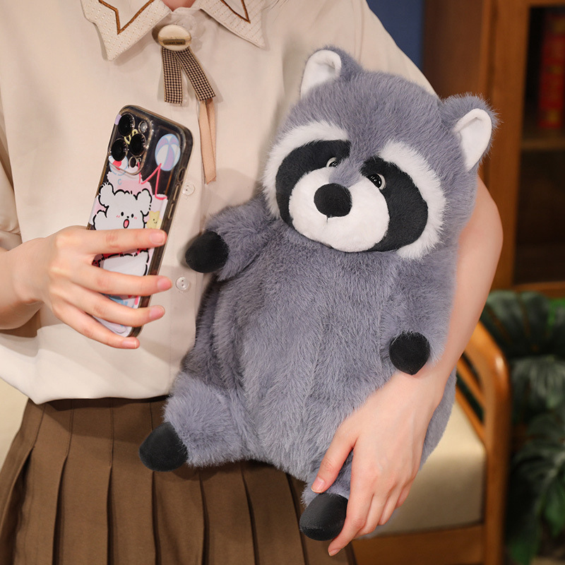 Chubby raccoon plush toy held comfortably in arms, showing fluffy texture and rounded body, ideal for hugging, relaxing, and enjoying casual moments at home with a warm and cozy feel