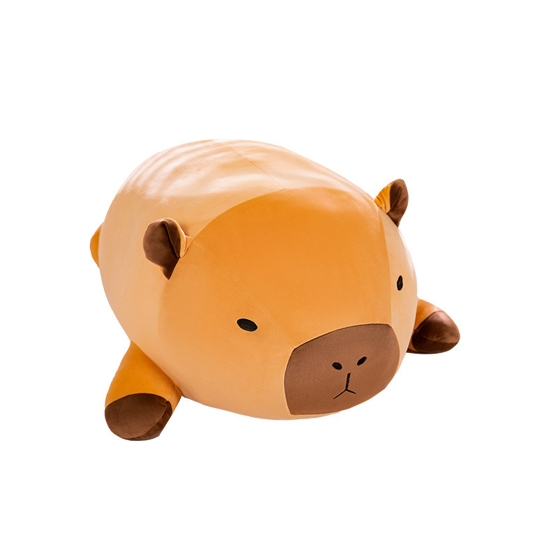 Lying capybara plush pillow with soft plush fabric and rounded body design, ideal for hugging, resting, or home decor