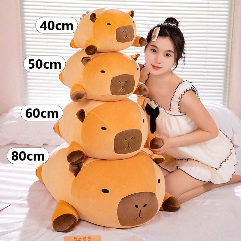 Lying capybara plush pillow size comparison showing 40cm 50cm 60cm and 80cm options for hugging and sleeping comfort