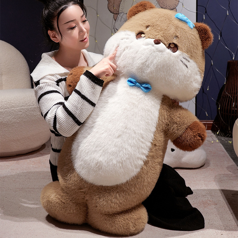 Sea otter plush toy displayed in a warm living space, highlighting fluffy texture, cute expression, and comforting design for cuddling and home decor