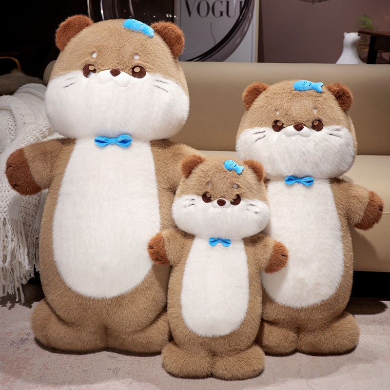 Sea otter plush toys in multiple sizes displayed together in a warm indoor space, featuring a cute standing design and soft plush fabric for hugging and home decor