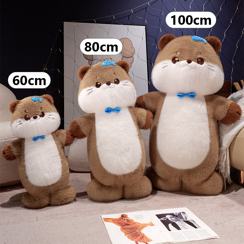 Sea otter plush toy size comparison showing 60cm, 80cm, and 100cm versions standing together in a cozy indoor setting, highlighting soft plush texture and hugging use