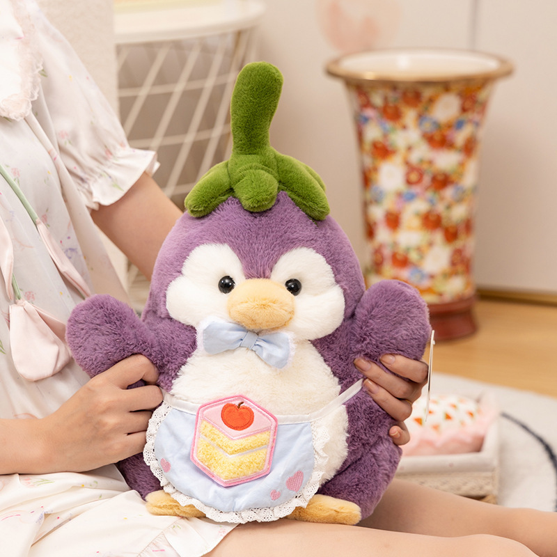Eggplant penguin plush toy with soft plush fabric and outfit details, cozy stuffed animal for hugging and relaxing