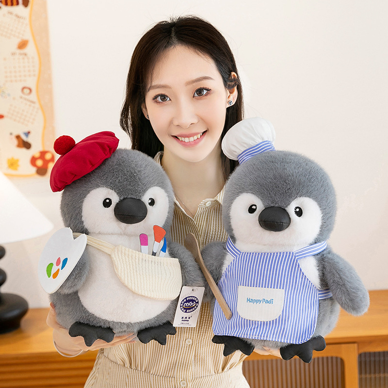Chef and painter chubby penguin plush toys displayed together, showcasing cute themed outfits, fluffy texture and comforting plush toy appeal