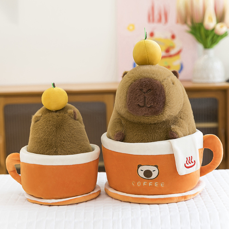 Coffee cup capybara plush toy in two sizes with removable capybara and cup design
