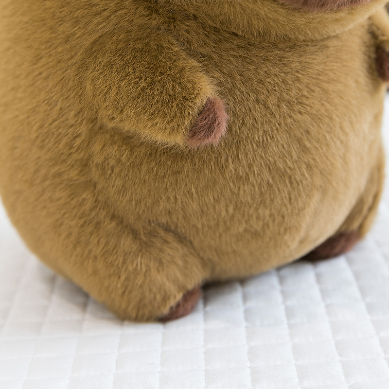 Coffee cup capybara plush toy soft plush fabric texture close up
