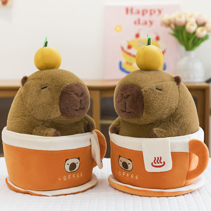 Coffee cup capybara plush toy front view showing capybara inside orange coffee cup