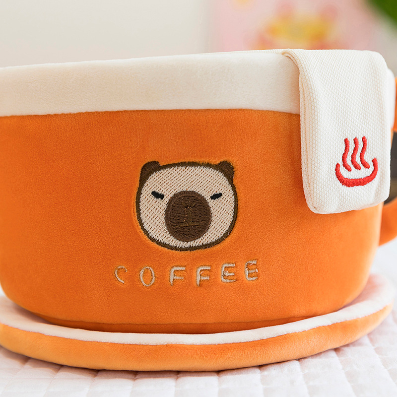Coffee cup capybara plush toy embroidered coffee cup detail with capybara icon and text