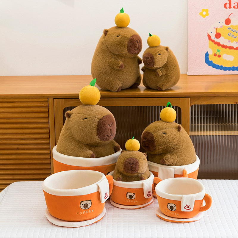 Coffee cup capybara plush toy collection showing removable capybara plush and matching cup and saucer set