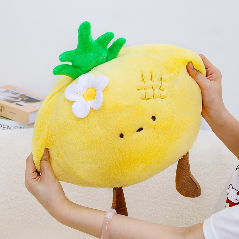 Pineapple fruit plush pillow showing soft plush fabric and squeezable comfort