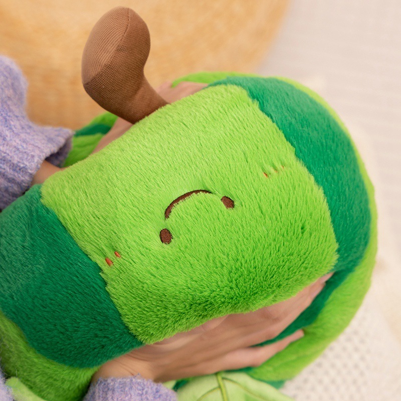 Watermelon fruit plush pillow close up highlighting soft plush fabric and cozy texture