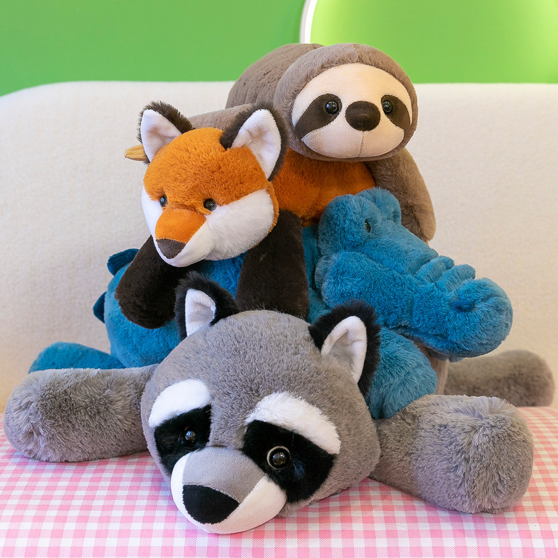 Lazy lying animal plush toy collection featuring raccoon, fox, sloth and crocodile stacked together on a bed, soft stuffed animals for hugging and cozy home decor