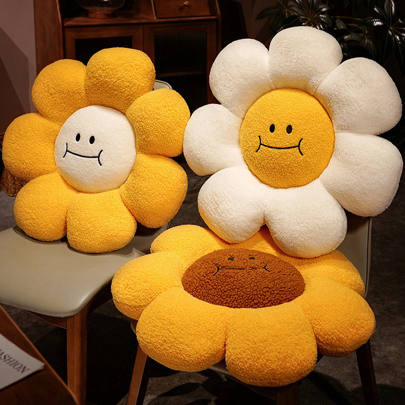 Sunflower plush cushions in three color variations displayed on chairs, soft round flower floor pillows with thick padded petals