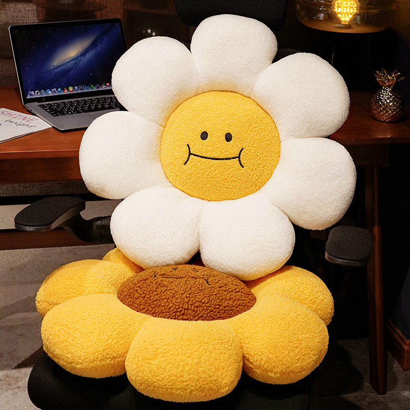 Sunflower plush cushion used as chair seat and back support, soft fluffy petals with smiling face design, ideal for home office comfort and cozy decor