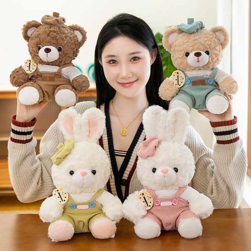 Artist mocha bear and mora bunny plush toys with gentle expressions and corduroy overalls, perfect for home decor and gifting