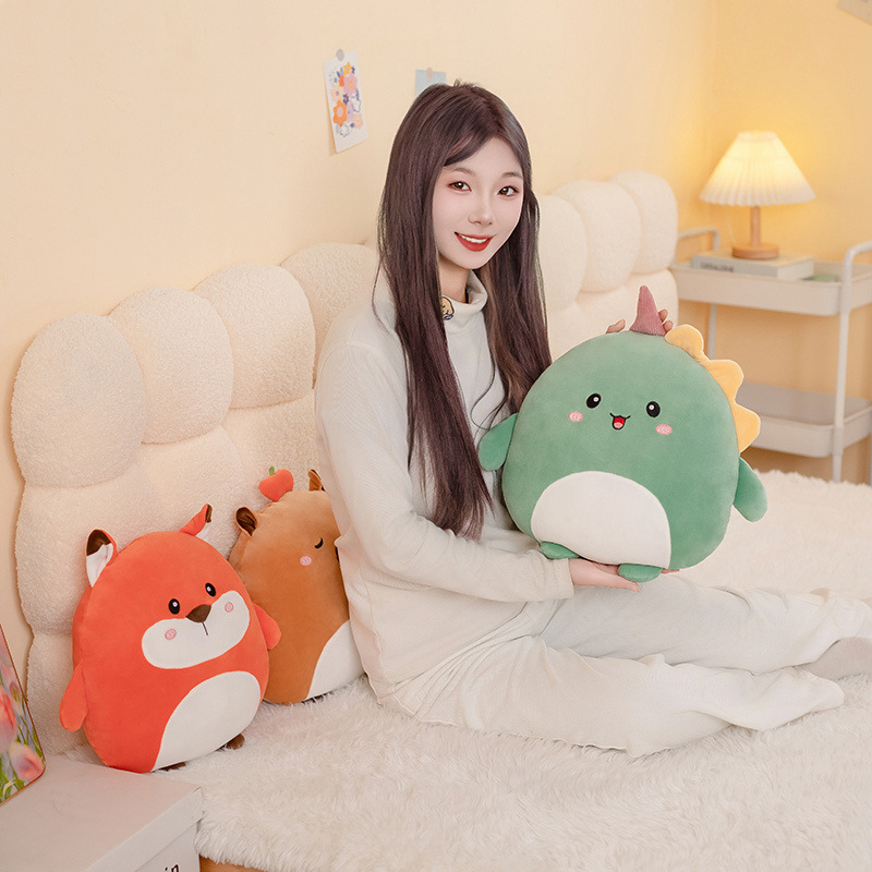 Dinosaur, fox, and capybara 36cm hess animal plush pillows arranged on a soft bed, highlighting their round shape and cozy home decor appeal