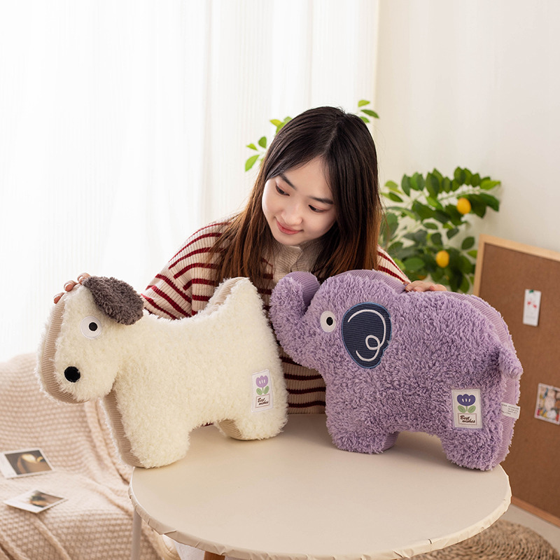 Dog and elephant maggie animal plush pillows shown as soft sofa cushions, featuring textured plush fabric and playful animal shapes for cozy home decor