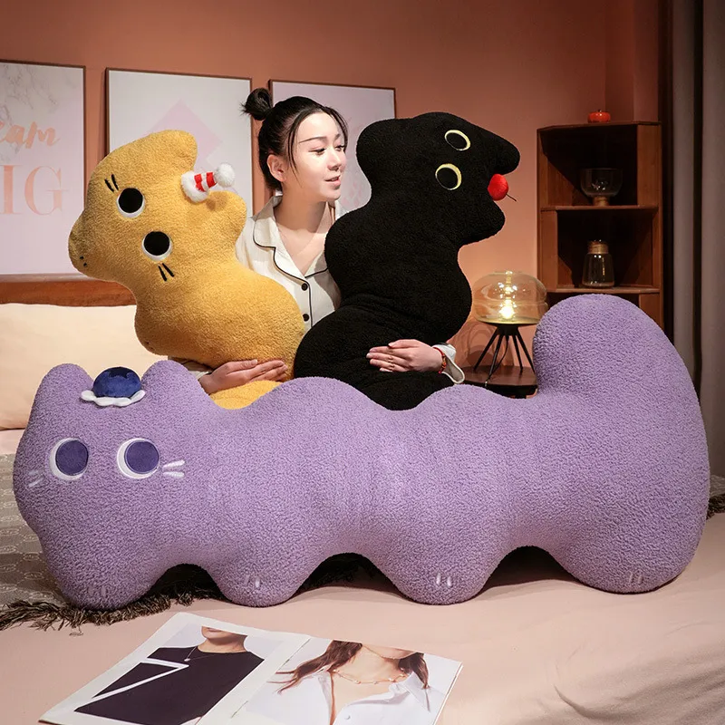 Cloud cat long plush pillow in black, yellow and purple colors, soft curved body cushion designed for hugging, lounging and cozy bedroom decor