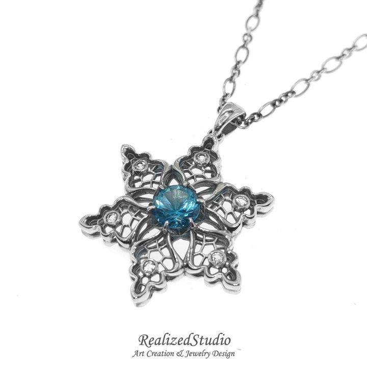 P21W06 004 snowflake-motif-silver-pendant-blue-topaz-tulle-design RealizedStudio Jewelry