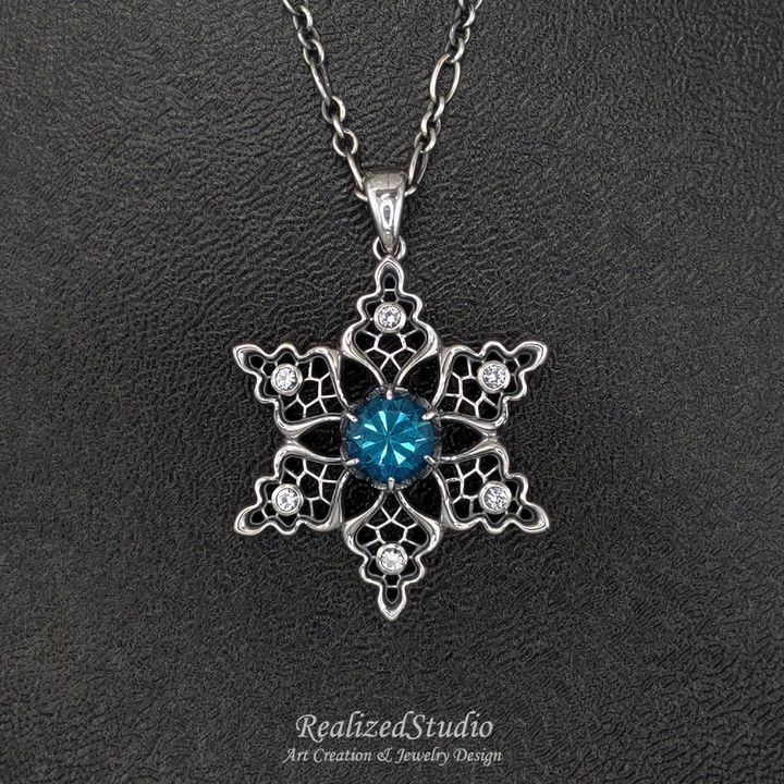 P21W06 007 snowflake-motif-silver-pendant-blue-topaz-tulle-design RealizedStudio Jewelry