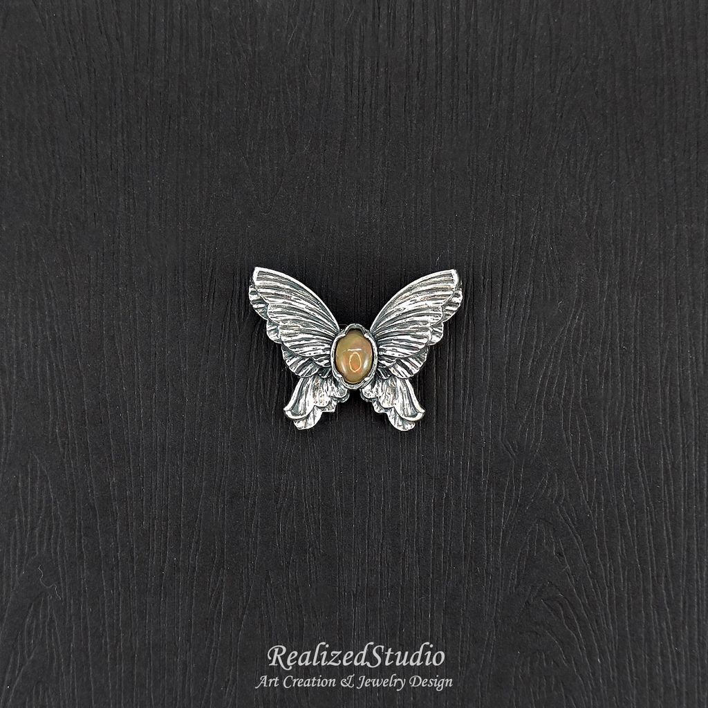 HP25908n243 002 orange-opal-silver-butterfly-pin-textured-wings RealizedStudio Jewelry