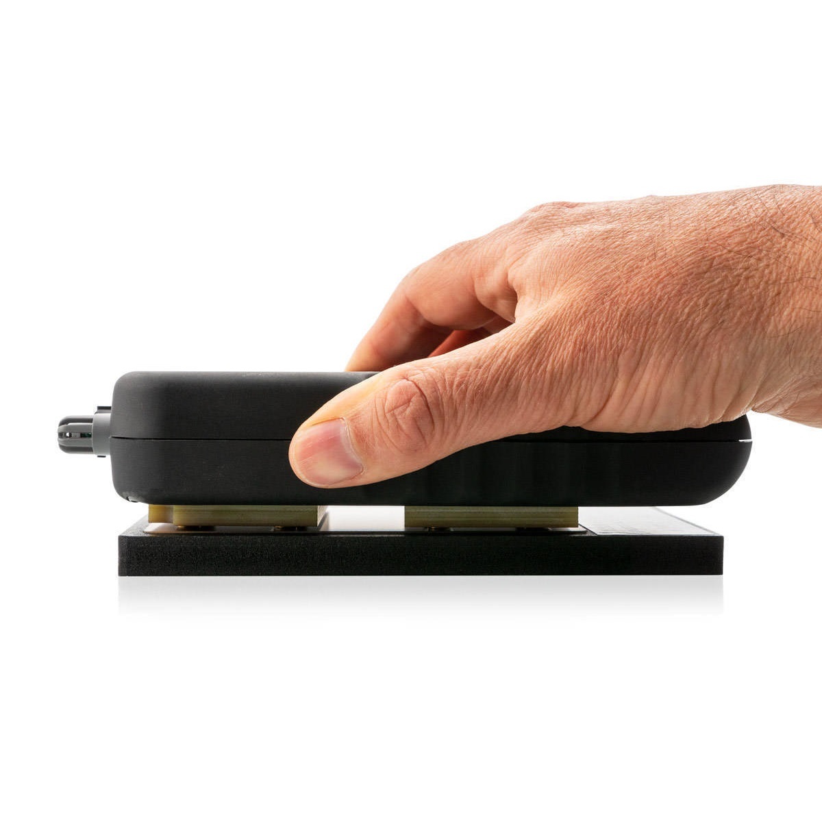 calcrh-calibration-check-plate-side-angle-with-meter-pressed-hand-2020 (1)