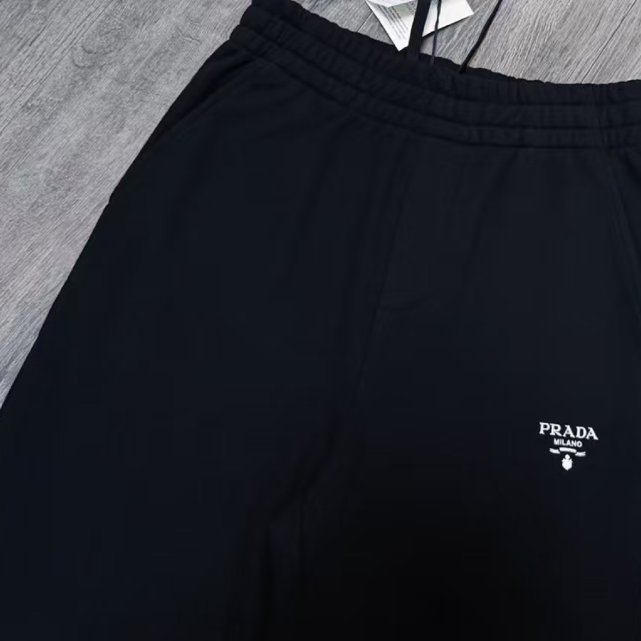 Prada Triangle Metal Logo Jogger Pants-04