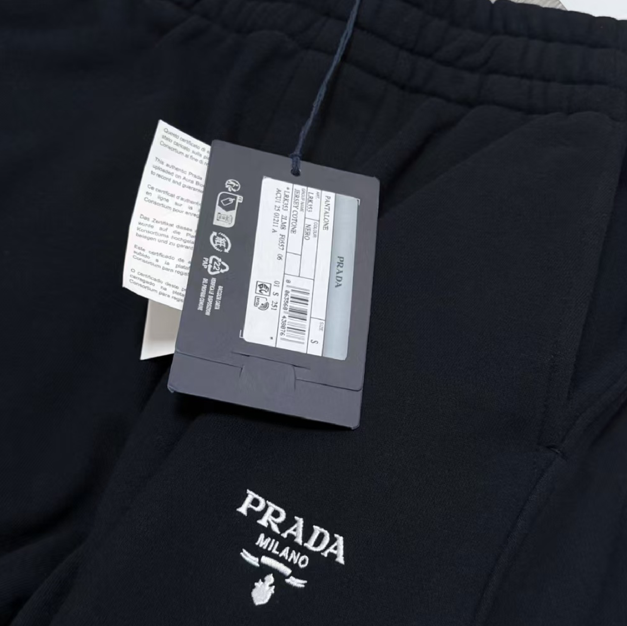 Prada Triangle Metal Logo Jogger Pants-05