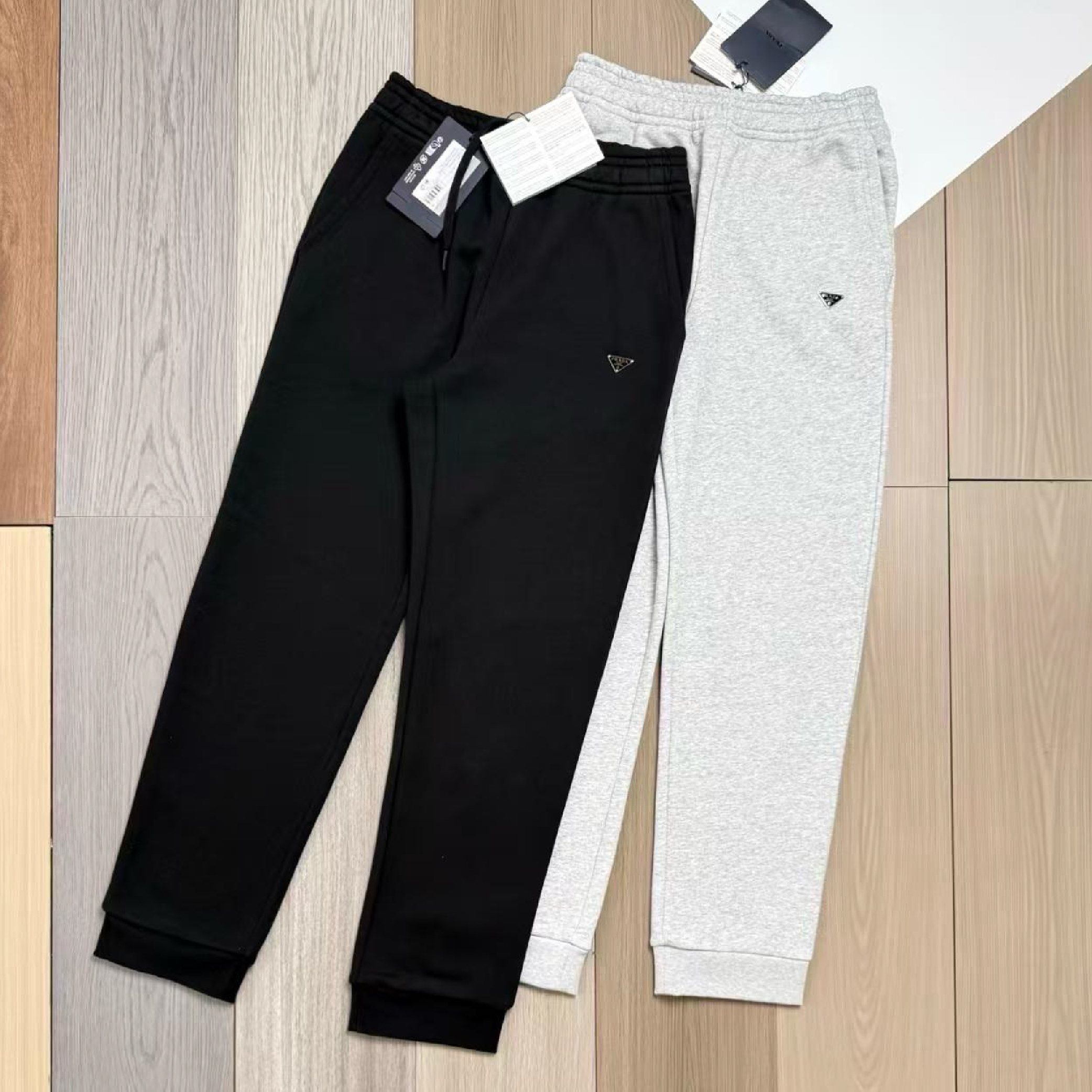 Prada Triangle Metal Logo Jogger Pants-07