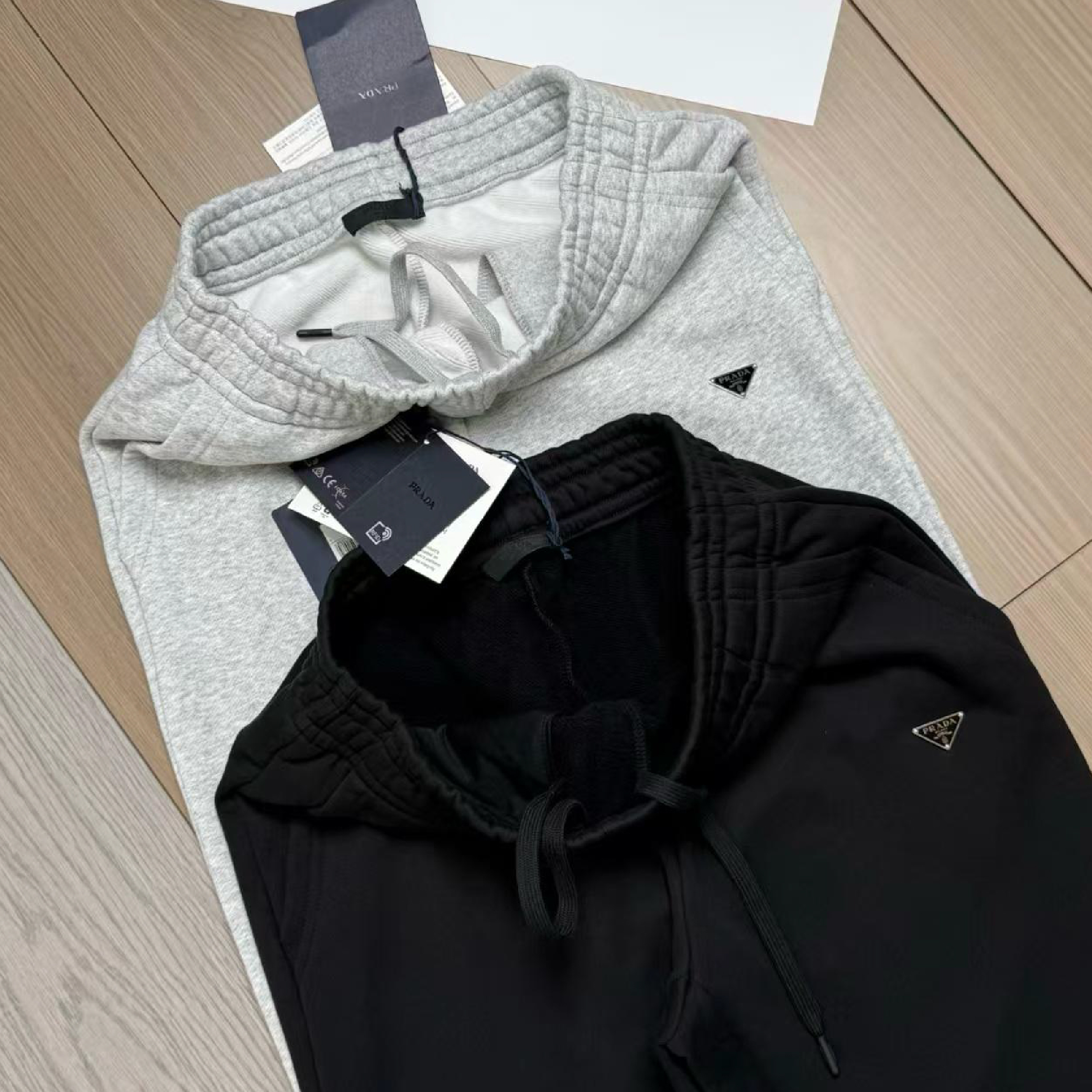 Prada Triangle Metal Logo Jogger Pants-06