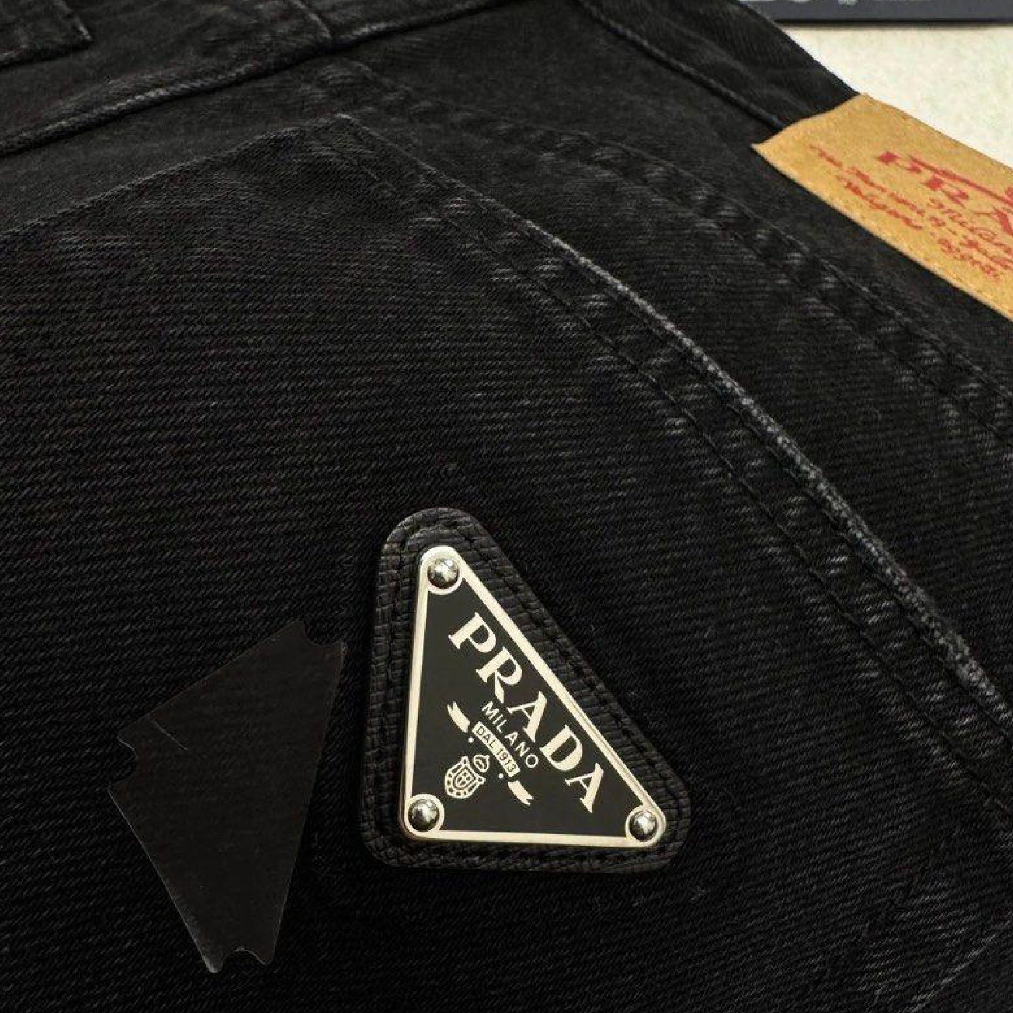 Prada women back logo wide-leg washed denim jeans-04