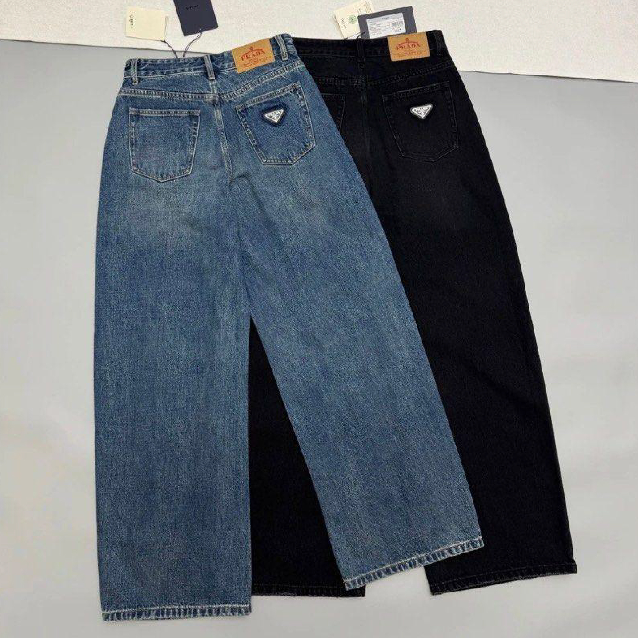 Prada women back logo wide-leg washed denim jeans-07