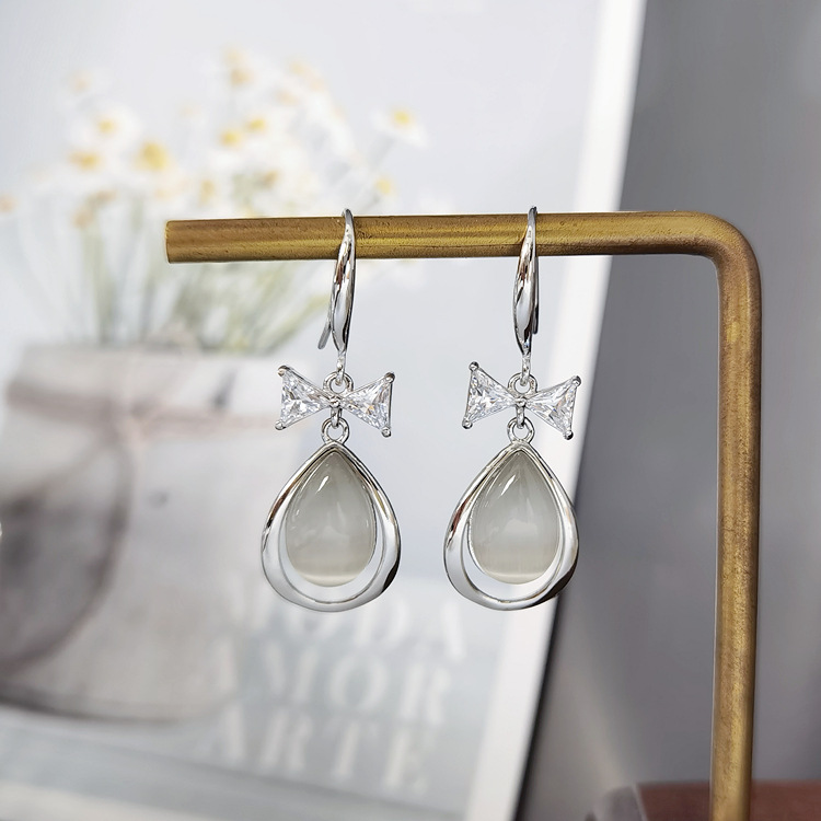 EH804046M蝴蝶结水滴猫眼耳环