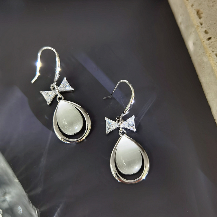 EH804046M蝴蝶结水滴猫眼耳环