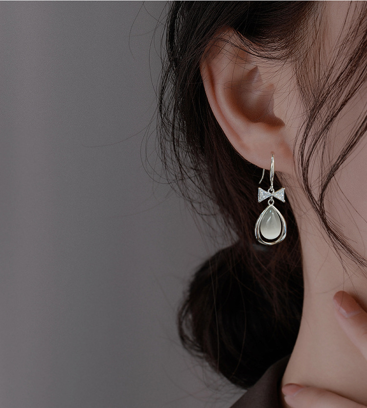 EH804046M蝴蝶结水滴猫眼耳环