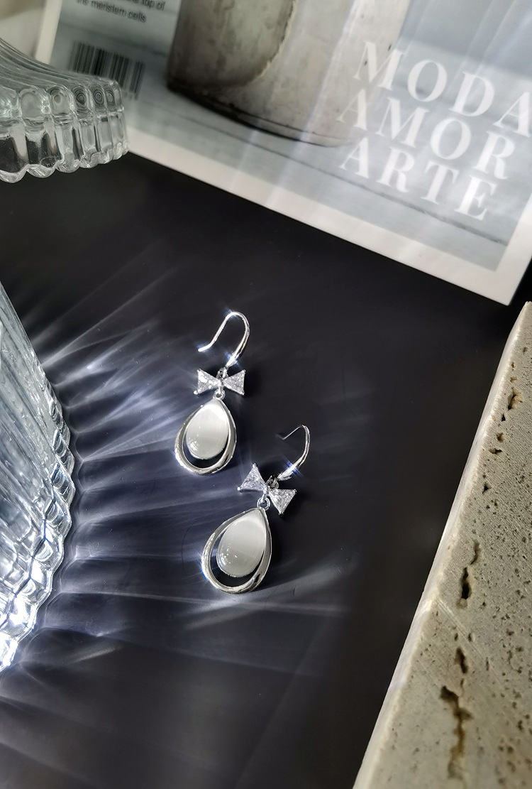 EH804046M蝴蝶结水滴猫眼耳环