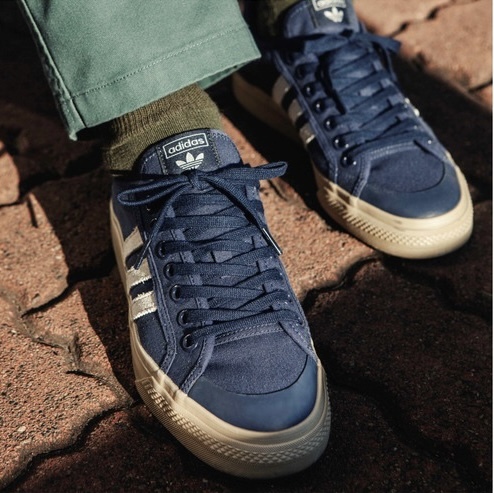 adidas originals nizza canvas trainers in white and blue