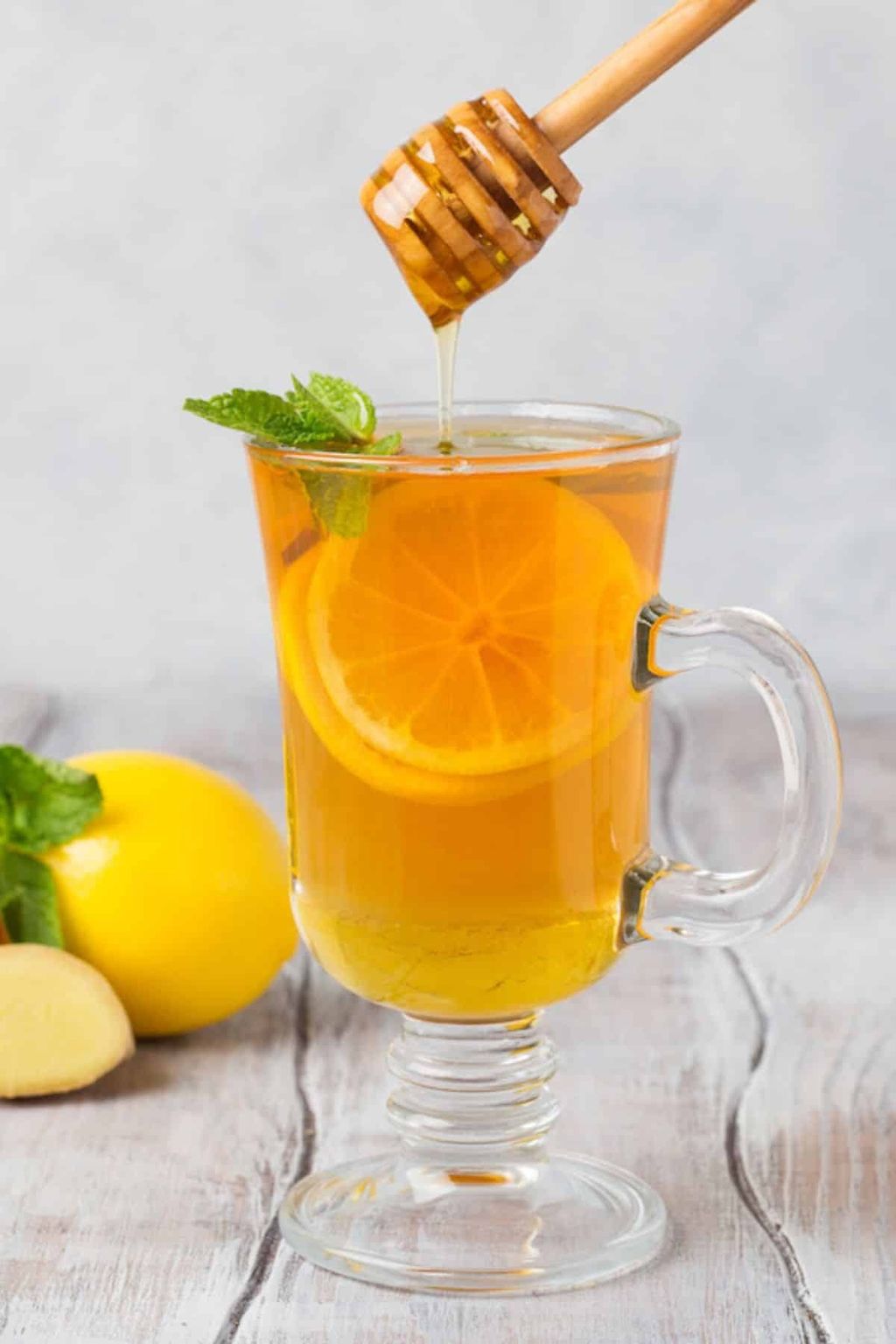 clear-mug-with-honey-lemon-tea