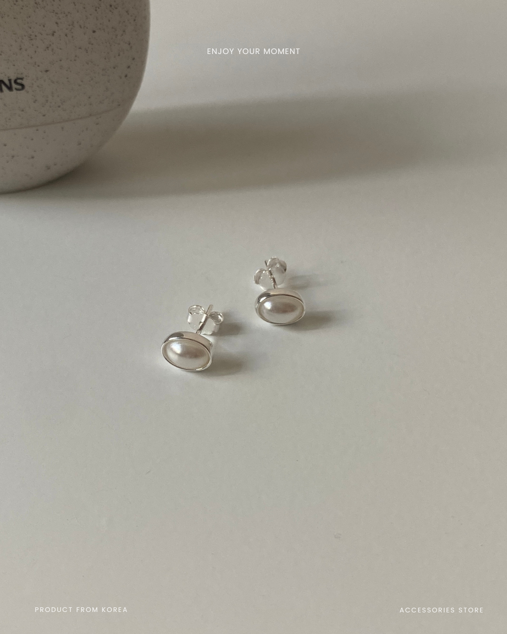 oval pearl studs
