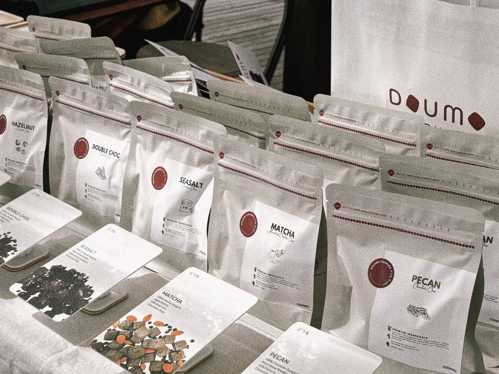 An early Doumo Cookies market display