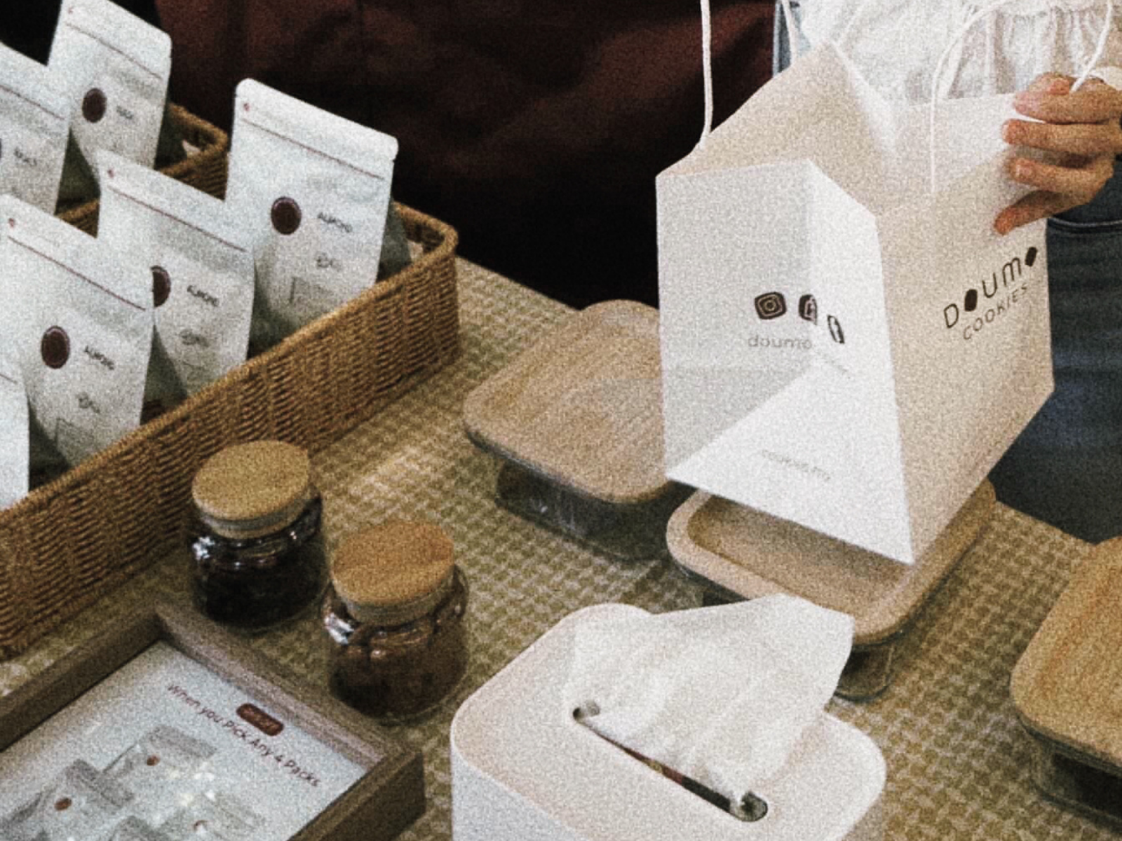 Packing Doumo Cookies at a market