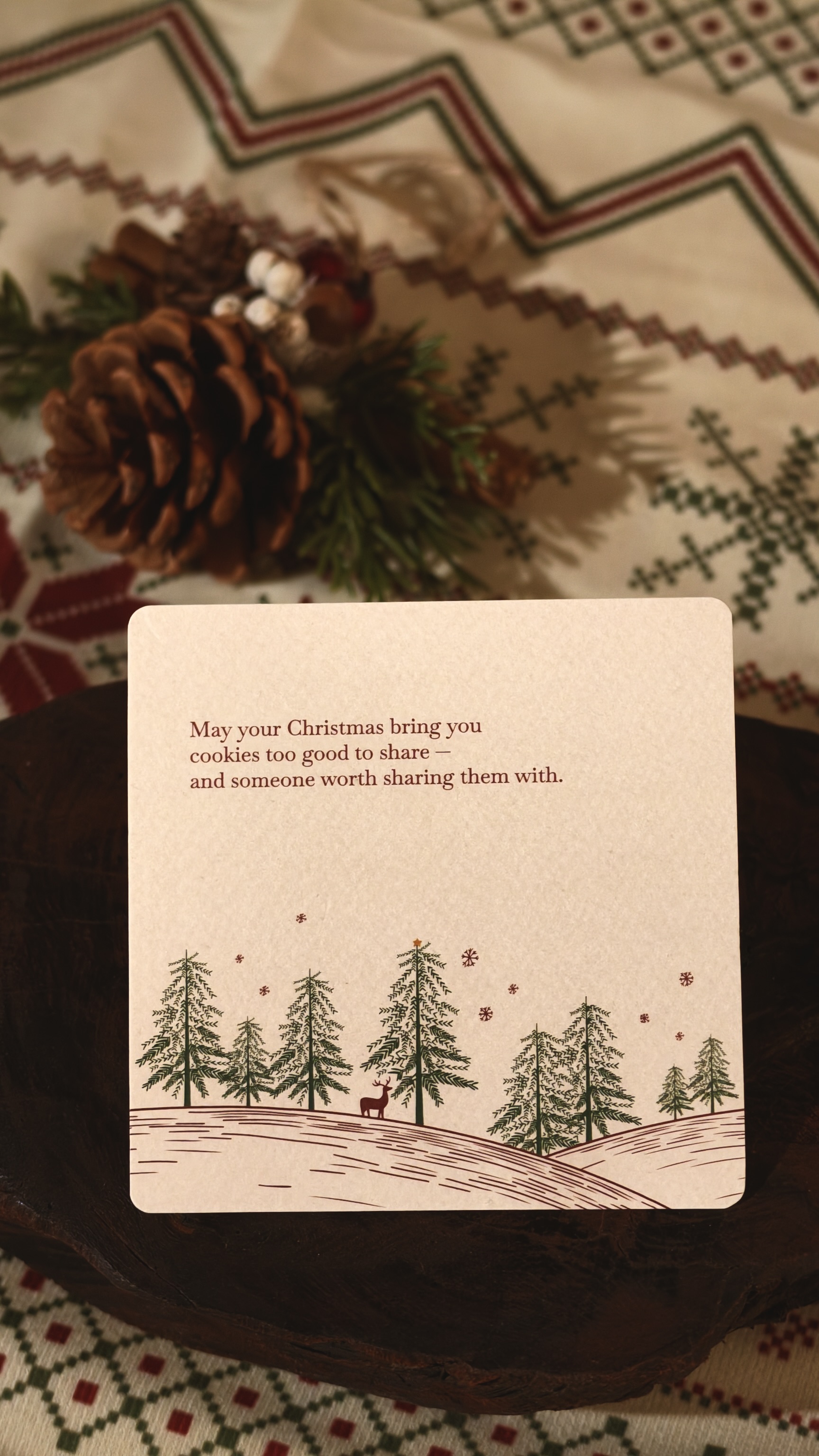 Illustrated Christmas card with a forest, a deer and a Christmas wish